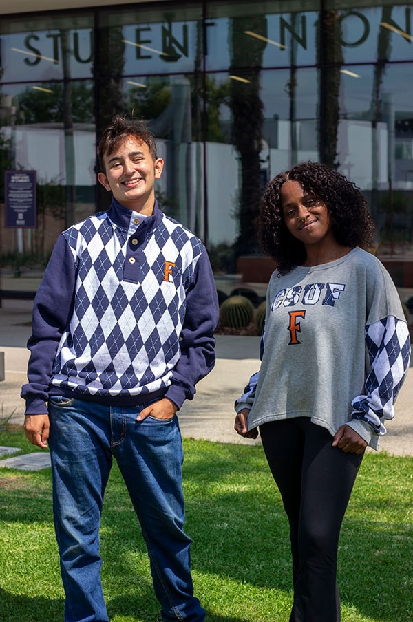 Students wearing argyle sweatshirts