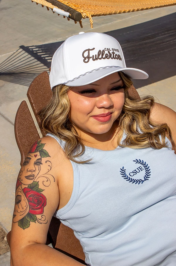 Student wearing women's apparel